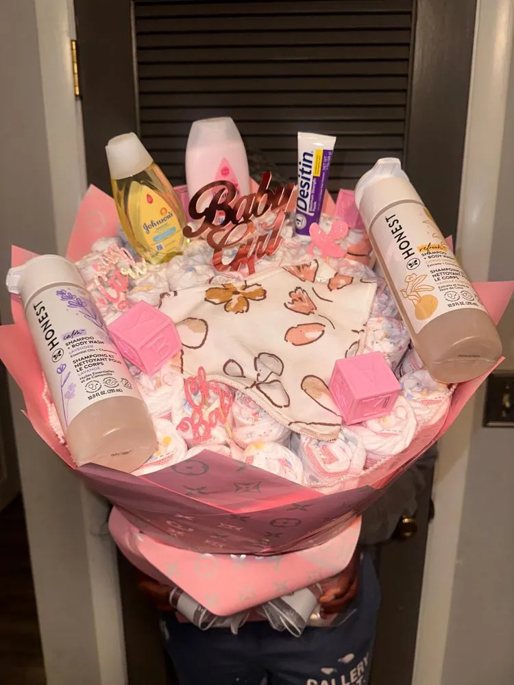 Pink Baby Girl diaper bouquet with shampoo, lotion and baby blocks