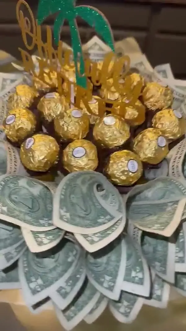 Bottle bouquet with money petals, Ferrero Rocher chocolates and a palm tree topper